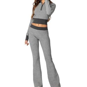 Ensemble deux pièces décontracté pour femme avec logo personnalisé, nouvelle mode, col montant, motif uni, haut court, pantalon évasé en tricot - Product Image 1
