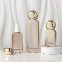 Ensemble d'emballages de luxe givrés pour soins de la peau avec couvercle sphérique unique, flacon et pot en verre de 20 ml à 120 ml pour marque de cosmétiques bio