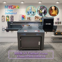 Impresora UV Plana 6090 Personalizada OEM ODM con 3/4 Cabezales, Mesa de Vacío, Impresión Directa CMYKWV en Vidrio, Metal, Madera, Rompecabezas, Carcasas de Teléfono