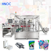 Machine de remplissage et de bouchage HNOC pour sachets souples à bec verseur de lait de soja liquide et jus de grenade, et pour la mayonnaise