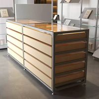 Vitrine d'îlot moderne en aluminium avec tiroirs multi-niveaux pour la maison, les boutiques, les bijouteries et les salles d'exposition