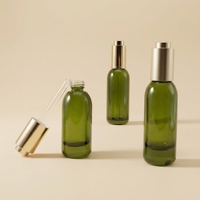 Flacon en verre dépoli mat de luxe à fond épais avec compte-gouttes à bouton poussoir doré pour sérum, huile et cosmétiques, impression sérigraphique