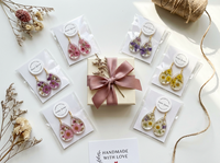 Boucles d'oreilles pendantes en résine avec fleurs séchées véritables, faites à la main, style bohème, bijoux naturels, cadeau pour femme, vente en gros