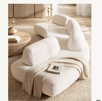 Italienischer Stil Leichter Luxus Casual Mikrofaser-Stoff Modernes Sofa-Set Unregelmäßiges Designer-Creme-Gebogenes Wohnzimmer-Villa-Sofa Klein