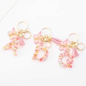 Wholesale Pink Sequin Letter Keychains Butterfly Tassel Resin Pendant <b>Keyrings</b> for <b>Women</b> - Product Image 1