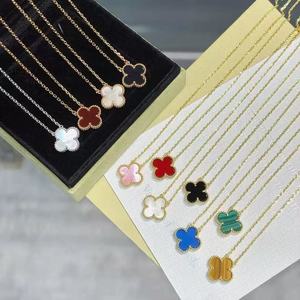 Collier Trèfle à Quatre Feuilles Haut de Gamme Unisexe en Tungstène Plaqué Or 18K avec Chaîne Croisée en Nacre, Pendentif de Luxe Tendance pour le Quotidien - Product Image 2