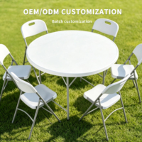 Table pliante ronde moderne et élégante pour les réunions de famille en plein air Matière plastique HDPE durable pour hôtels et parcs