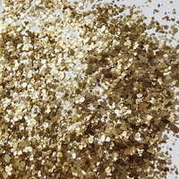 Vente en gros d'usine : Flocons de mica colorés, éclats de roche jaune doré, pour la production de peinture de sol en usine.