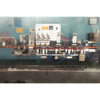 Machine de fabrication de tubes souples pour dentifrice ABL