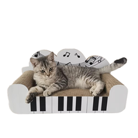 Fabrik-Großhandel OEM Benutzerdefiniertes Logo Klavierförmiger Wellpappe-Katzenkratzer und -Liege, Musikalisches Design Karton-Katzenbett