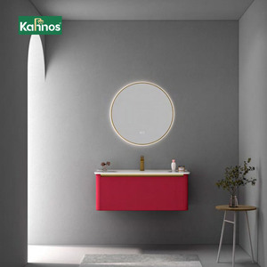Meubles-lavabos muraux rouges pour salle de bain avec miroir LED rond à cadre doré et lavabo blanc intégré - Product Image 1