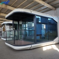 Maison conteneur moderne carrée extensible et respirante, de qualité supérieure, type capsule spatiale modulaire, pour usage scolaire, villa, centre commercial et hôtel