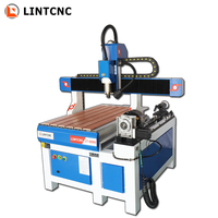 Enrutador Cnc de 4 ejes para cortar madera, Metal, aluminio, piedra, máquina 6090 6012 9012 9015, precio de la máquina
