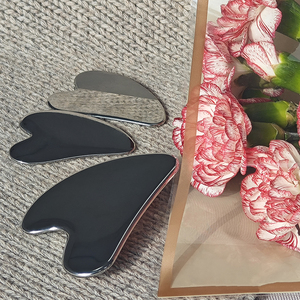 Premium Stainless Steel Gua Sha Scraping Massage Tool Set with Face Ice <b>Roller</b> for Ultimate Relaxation and Skincare - Product Image 1