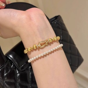 Bracciale Trendy con Fibbia a Ferro di Cavallo Effetto Occhio di Gatto Dorato, Bracciale Elastico Vintage di Alta Gamma per Feste - Product Image 5