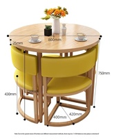 Ensemble de table à manger ronde minimaliste et tendance pour économiser de l'espace, avec 4 chaises rembourrées pour les petits espaces, la maison ou le restaurant