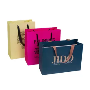 थोक कस्टम लोगो कपड़े खरीदारी उपहार बैग रंगीन पेपर बैग कंपनी टोट पेपर बैग कंपनी टोट पेपर बैग