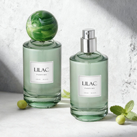 Flacon de parfum cylindrique vert clair très demandé, avec bouchon en verre tourbillonnant en option ou pompe pulvérisatrice argentée, logo et boîte personnalisables