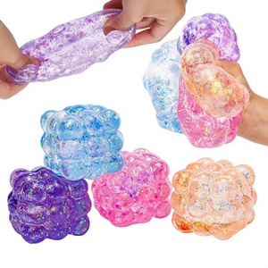 Aurora Cube Squishy, Juguete Antiestrés de Melaza con Rebote Lento y Aspecto Visualmente Impresionante, Material de Goma, para Jóvenes de 15 a 35 Años - Product Image 1