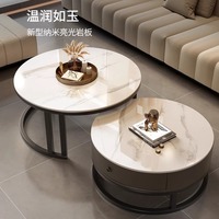 Table basse moderne en acier inoxydable avec plateau en dalle de roche ronde, rangement et fonction extensible pour le mobilier de salon
