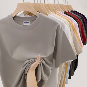 เสื้อยืดโอเวอร์ไซส์สีขาวล้วนคุณภาพสูง ผลิตจากผ้าฝ้ายแท้ 100% สำหรับผู้ชาย  รับสั่งพิมพ์ลายตามต้องการ - Product Image 1