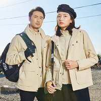 Veste bomber d'hiver trois-en-un coupe-vent et imperméable à capuche avec doublure polaire amovible pour usage unisexe, motif lettres imprimées