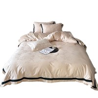 Ensemble de literie quatre pièces en coton longue fibre 100 fils, style luxe léger haut de gamme, jacquard satiné, housse de couette et drap