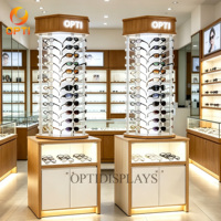 Tour de présentation rotative en bois pour lunettes, vitrine sur pied éclairée par LED avec base de rangement verrouillable pour magasin d'optique