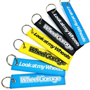 Promotional Wholesale Custom Brand Name Travel Souvenir Woven Embroidery Logo Fabric Keychains - Product Image 2
