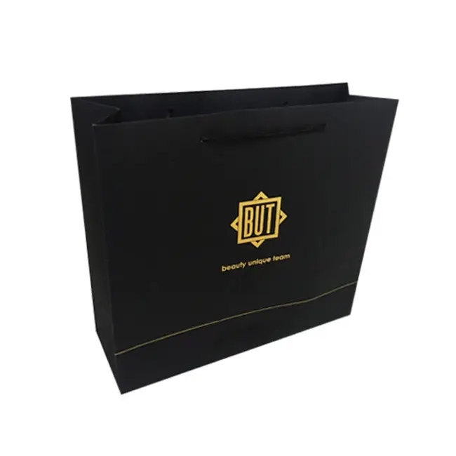 थोक फैशनेबल लक्जरी ब्लैक क्राफ्ट पैकेजिंग पेपर बैग मुद्रित कस्टम लोगो कपड़े खरीदारी उपहार आभूषण वाइन पेपर बैग