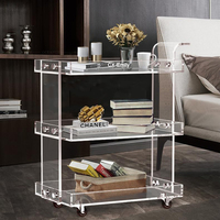 Arabie Saoudite Vente chaude Chariot de bar moderne à 3 niveaux en acrylique transparent Lucite pour salle à manger, hôtel, service de boissons, chariot à roulettes