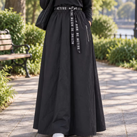 EVE074 Pakaian Muslim Khusus Rok Maxi Hitam Pakaian Islami Rok Panjang Model A-Line Pinggang Tinggi dengan Sabuk Berhuruf dan Saku Resleting