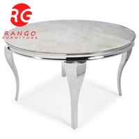 Ensemble de table à manger ronde en marbre Ensemble de table à manger ronde grise circulaire pour 4 chaises