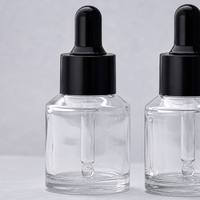 Flacon compte-gouttes en verre transparent de 30 ml avec bouchon pipette noir pour huiles essentielles, sérum, emballage cosmétique, fournisseur en gros B2B