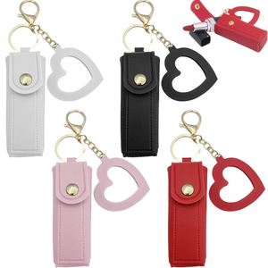 Organisateur de baumes à lèvres en cuir PU pour voyage, étui de rangement de maquillage avec miroir en forme de cœur, porte-rouge à lèvres pour femme, porte-clés - Product Image 1