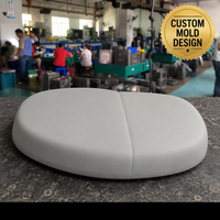 Coussin de confort ovale gris simplifié avec détail de couture centrale, surface mate lisse, support ergonomique, moulage par injection, usine OEM
