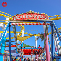Manège familial pour parc d'attractions, quai en bord de mer et fête foraine, sièges banquette pour enfants, équipement de fête foraine pour enfants