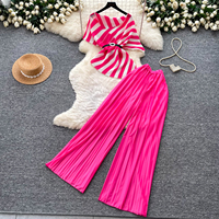 Ensemble 2 pièces élégant d'été pour femme : haut asymétrique et pantalon taille haute imprimé floral, coupe ajustée, vente en gros