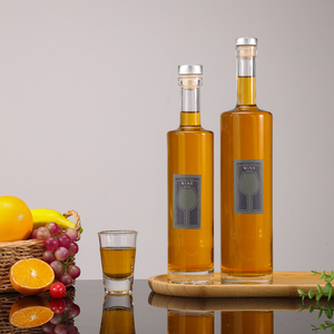 Conteneur de vin de stockage de saké de <span class=keywords><strong>cidre</strong></span> de <span class=keywords><strong>gin</strong></span> clair 500/750ml bouteilles en verre rondes de vodka hydromel de brandy de boisson d'alcool de boisson d'alcool avec couvercle en liège - Product Image 2