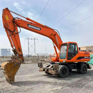 Superbe réduction sur l'excavatrice sur pneus d'occasion Doosan DH210W-7, 21 tonnes, capacité de la benne de 0,86 m³, moteur, boîte de vitesses, performances optimales, en vente - Product Image 1