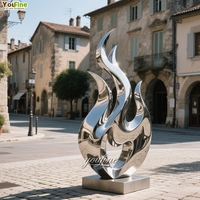 Sculpture de flamme moderne YouFine en acier inoxydable, finition miroir, art métallique pour la décoration de centres commerciaux et de jardins, personnalisable et certifiée