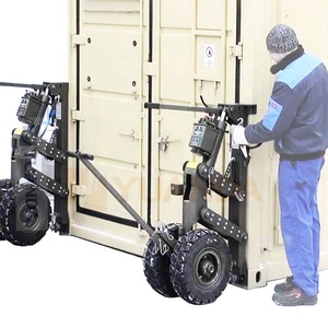 Système de transport mobile ISO Corner Wheel pour conteneurs maritimes, avec outil de remorquage et de levage, pour le déplacement et le transport de conteneurs. - Product Image 1
