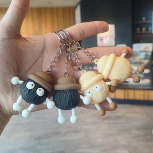 Portachiavi a Forma di Pallina di Carbone Cartoon per Accessori Scarpe, Staccabile per Fori e Lacci - Product Image 1