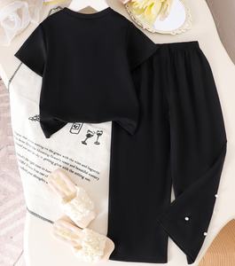 Set Abbigliamento Estivo 2026 per <span class=keywords><strong>Bambina</strong></span>, Maglietta Nera con Collo a O e Fiori 3D + Pantaloni, <span class=keywords><strong>Completo</strong></span> 2 Pezzi - Product Image 2