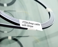 Cable de acero GJYXCH fibra óptica FTTH para exteriores 1 núcleo 2/4/6 g652d g657a Cable de caída de fibra FTTH de raya LSZH de modo único