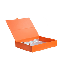 Boîtes en papier de style couverture estampées or avec fond gris pour flacons de parfum, emballage cadeau
