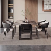 Table et chaises de salle à manger modernes en pierre de luxe pour la maison Pieds de table modernes minimalistes en acier inoxydable et marbre haut de gamme Table à manger