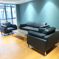 Luxuriöses Schwarzes Leder-Chefsessel-Sofa-Set mit Holzrahmen und Edelstahlbeinen für Wohnzimmer, Hotel und Schule