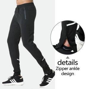 Venta al por mayor personalizado en blanco <span class=keywords><strong>pantalones</strong></span> de chándal de poliéster de los hombres <span class=keywords><strong>Slim</strong></span> <span class=keywords><strong>Fit</strong></span> cremallera pie <span class=keywords><strong>para</strong></span> <span class=keywords><strong>hombre</strong></span> Jogger <span class=keywords><strong>pantalones</strong></span> con rayas reflectantes - Product Image 1