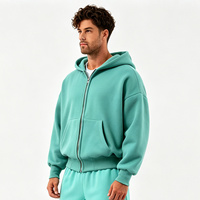 Vente en gros Sweat à capuche zippé oversize ample en coton-polyester épais brodé pour homme